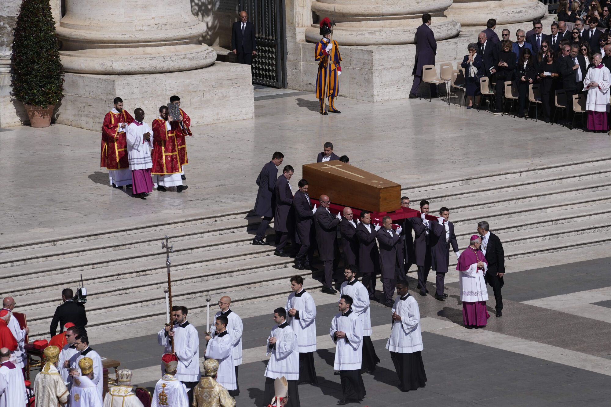 The coffin of Pope Francis is carried into St Peter's Square for his funeral, at the Vatican, Saturday, April 26, 2025. (AP Photo/Gregorio Borgia). EDITORIAL USE ONLY/ONLY ITALY AND SPAIN