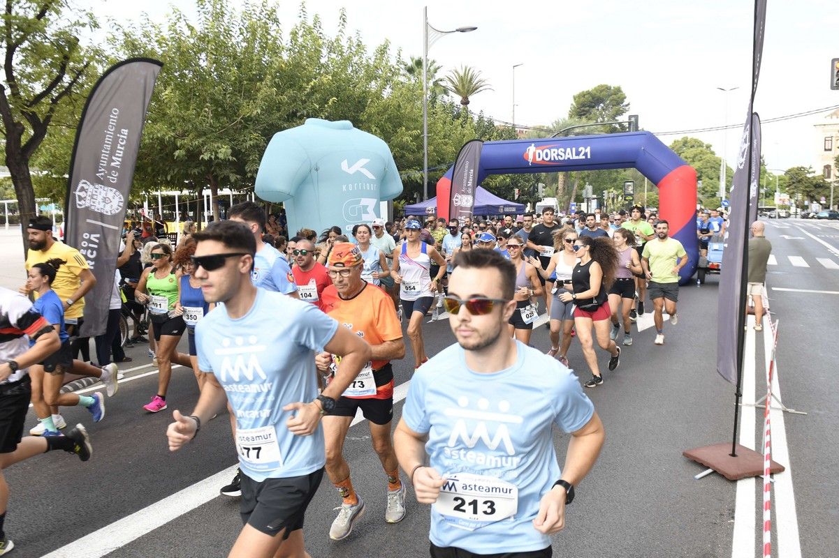 La carrera y marcha Solidaria Asteamur, en imágenes