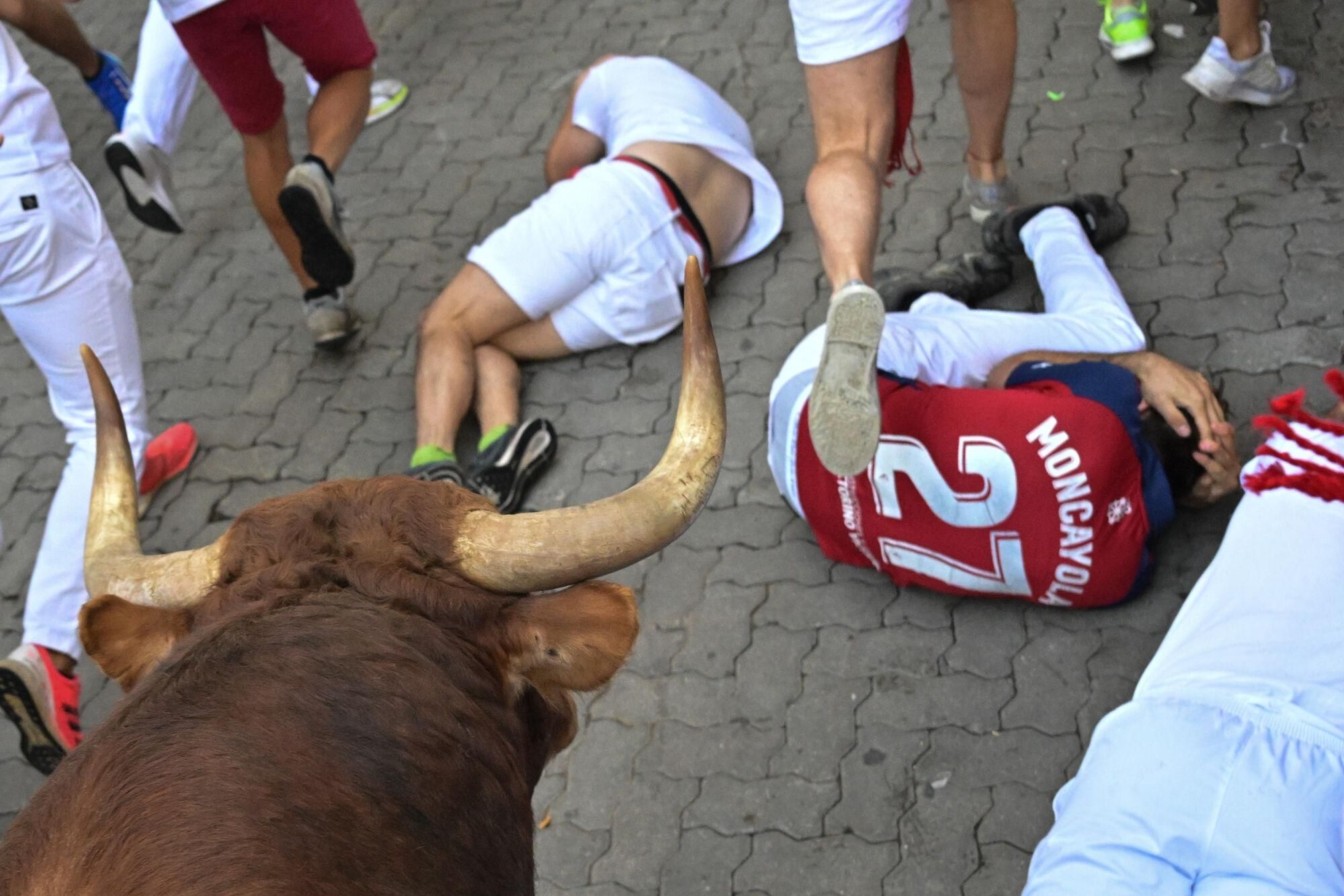 El quinto encierro de los Sanfermines 2025, en imágenes.