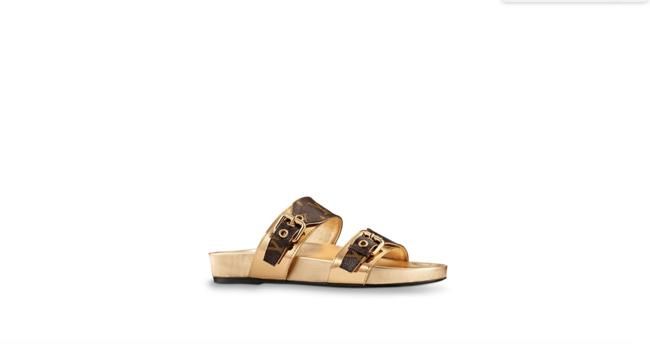 Mules dorados de Louis Vuitton