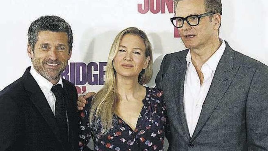 Dempsey, Zellweger y Firth, ayer, en Madrid. // EFE