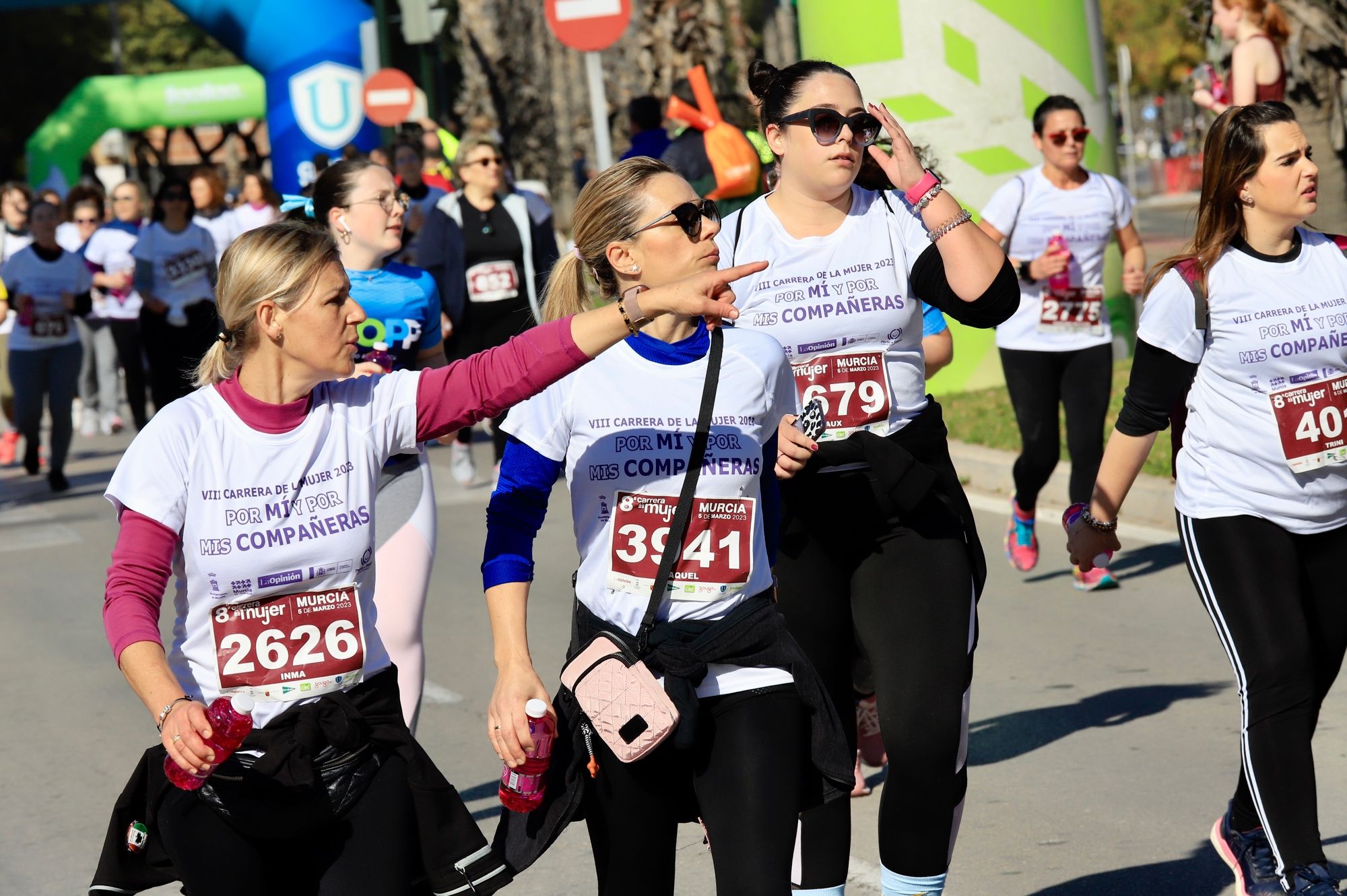 La salida y el recorrido de la Carrera de la Mujer 'inmortalizados' en imágenes