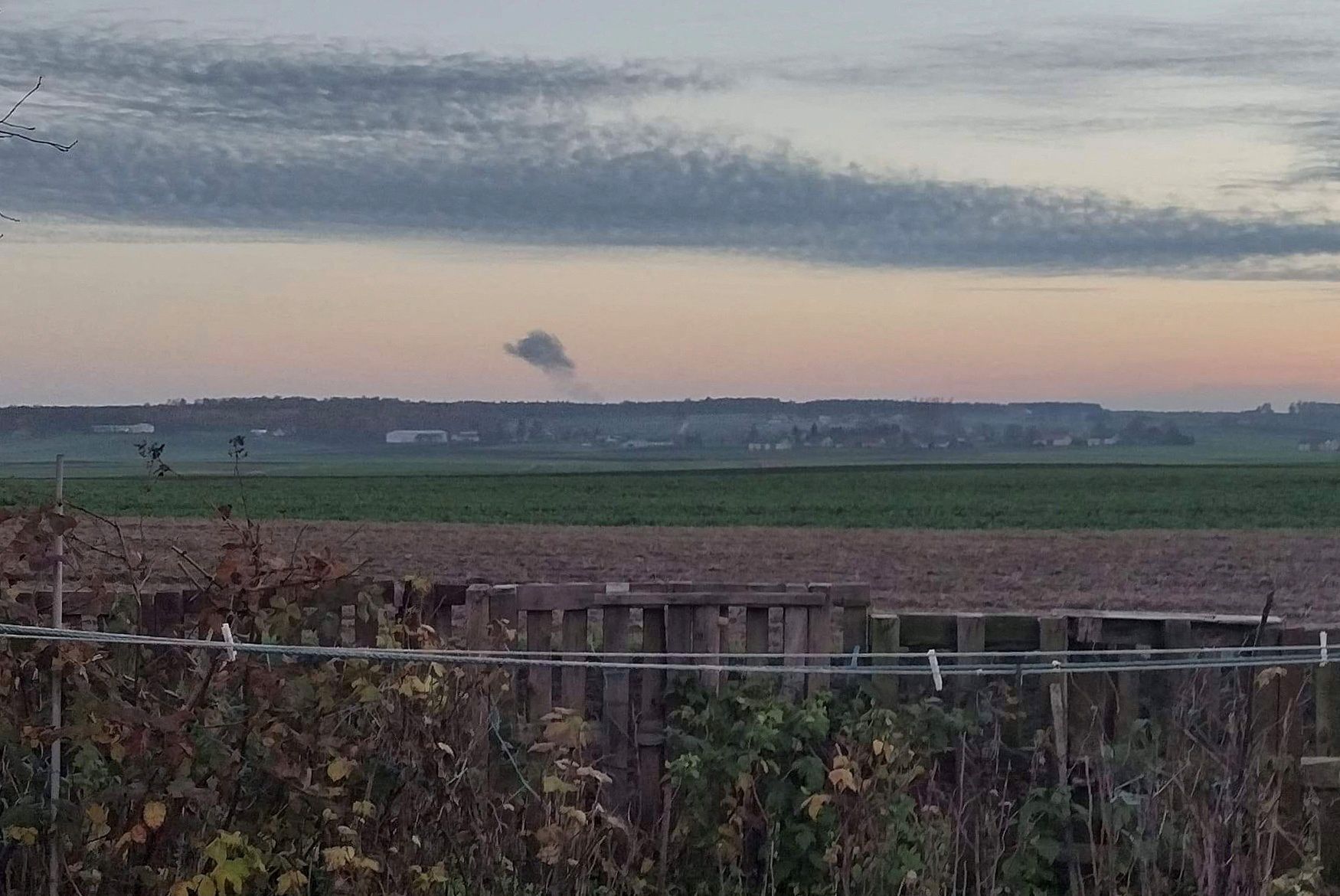 Smoke rises in the distance, amid reports of two explosions, seen from Nowosiolki, Poland, near the border with Ukraine November 15, 2022.