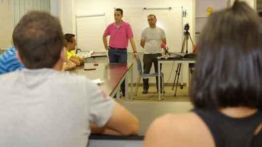 Luciano Huerga y Fernando Marcos durante la clausura.