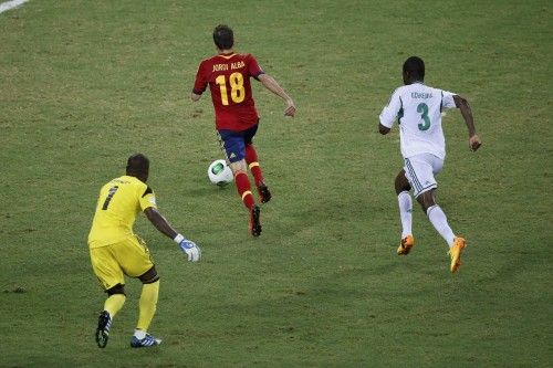 Spain's Alba shoots to score near Nigeria's Echiejile and goalkeeper Enyeama during their Confederations Cup Group B soccer match at the Estadio Castelao in Fortaleza