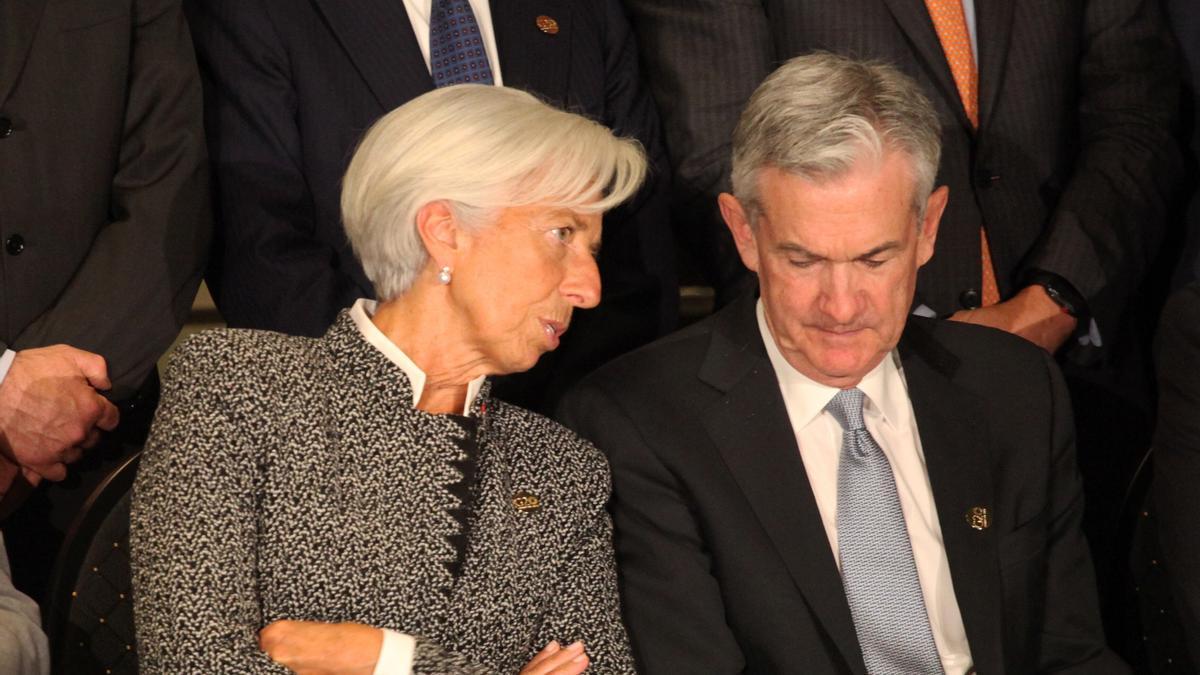 21 July 2018, Argentina, Buenos Aires: Christine Lagarde (M), Director of the International Monetary Fund, and Jerome Powell, President of the Federal Reserve, sit together for a group photo at the meeting of G20 finance ministers. Photo: . - Buenos Aires/Argentina  Claudio Santisteban/dpa