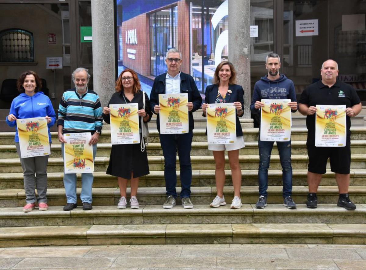 Autoridades y representantes de los clubes de atletismo de Ames / c.a.