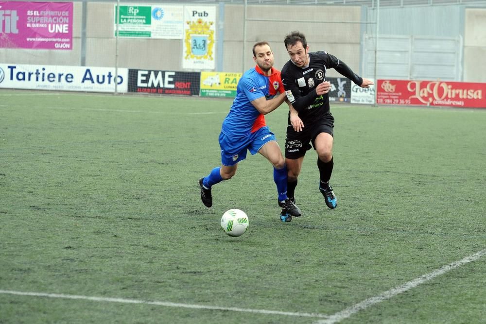 El partido entre el Langreo y el Siero, en imágenes