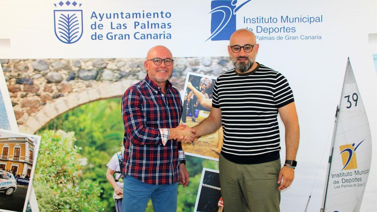 Imagen de la rubrica del acuerdo de colaboración entre el Instituto Municipal de Deportes de Las Palmas de Gran Canaria y la Universidad de Las Palmas de Gran Canaria.