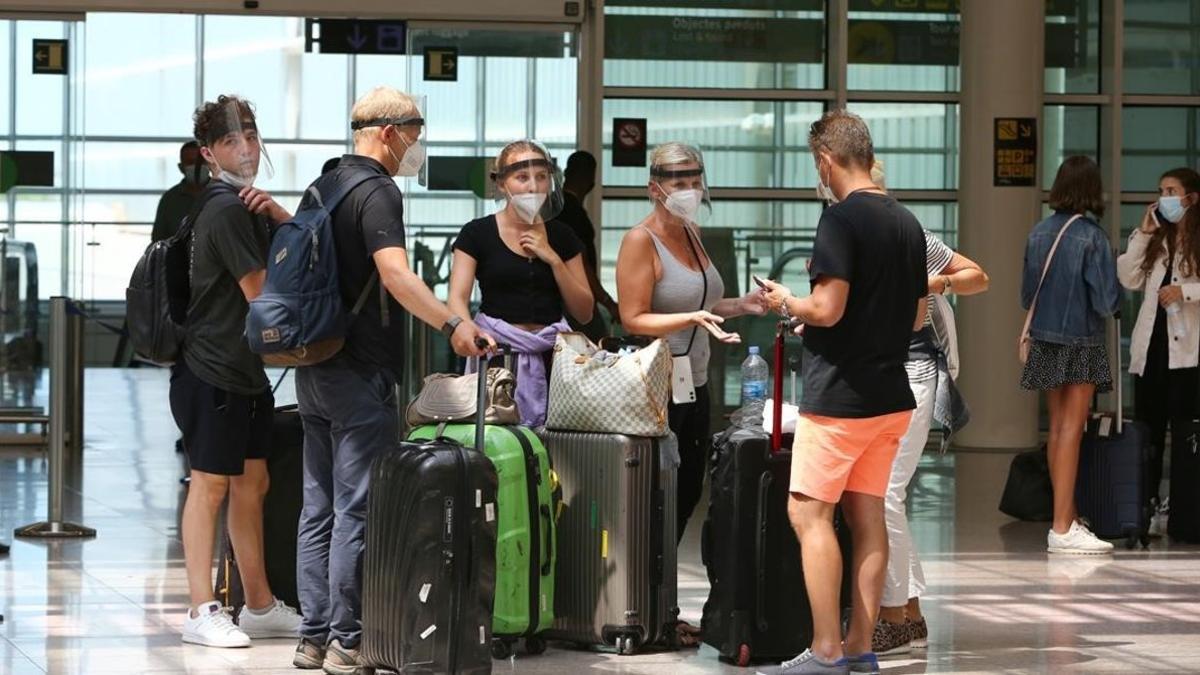 Turistas alemanes llegados a Barcelona a finales de julio.