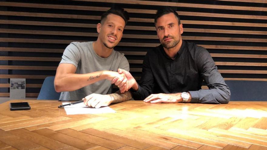 Iván Rodríguez, junto a Juan Rodríguez, miembro de la dirección deportiva del Málaga CF