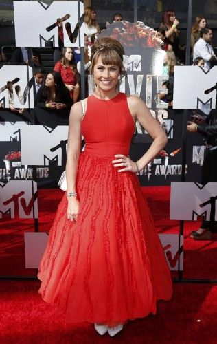 Actress Nikki DeLoach arrives at the 2014 MTV Movie Awards in Los Angeles