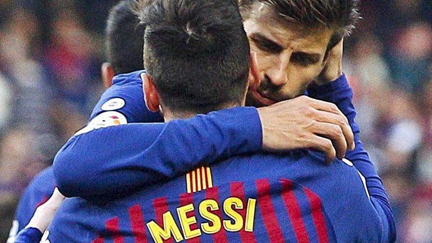 Una imagen de Leo Messi con Piqué
