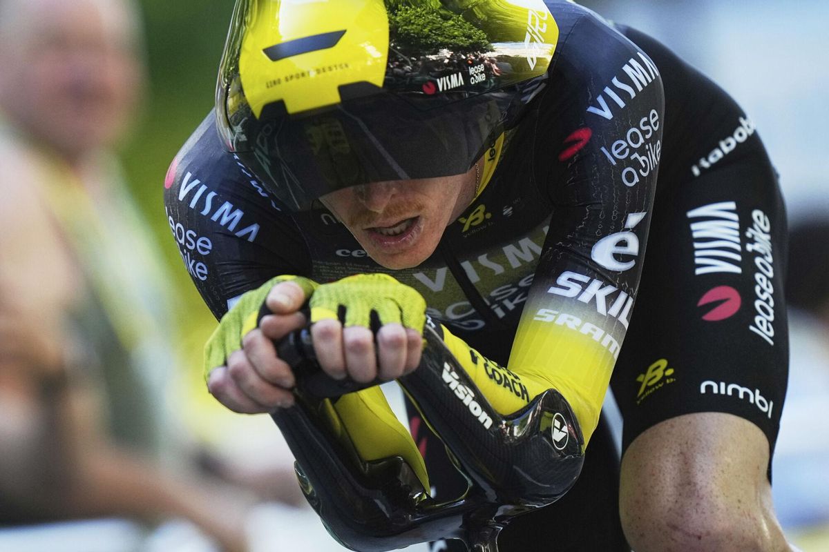 Matteo Jorgenson of the U.S. crosses the finish line during the fifth stage of the Tour de France cycling race, an indivdual time-trial over 33 kilometers (20.5 miles) with start and finish in Caen, France, Wednesday, July 9, 2025. (AP Photo/Thibault Camus)