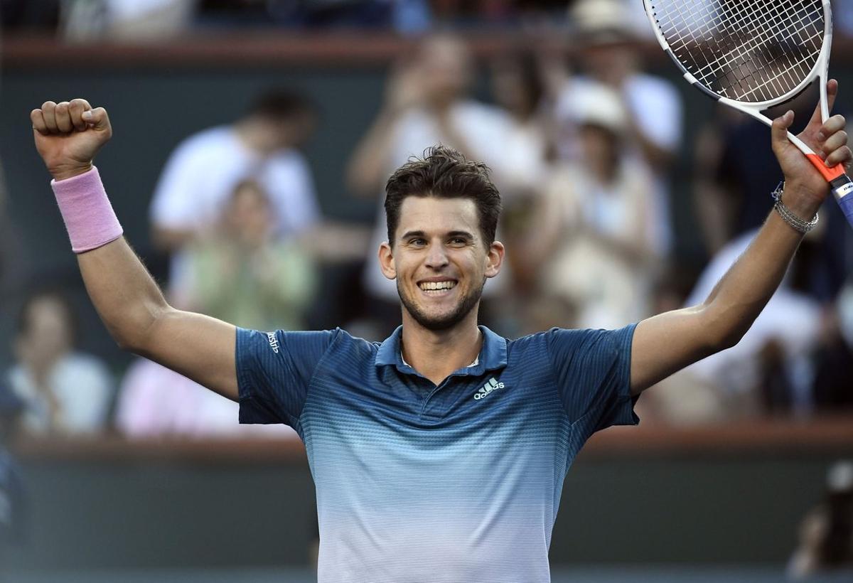INDIAN WELLS, CA - MARCH 17: Dominic Thiem of Austria celebrates after defeating Roger Federer of Switzerland in the men’s singles final on day fourteen of the BNP Paribas Open at the Indian Wells Tennis Garden on March 17, 2019 in Indian Wells, California.   Kevork Djansezian/Getty Images/AFP (Photo by KEVORK DJANSEZIAN / GETTY IMAGES NORTH AMERICA / AFP)