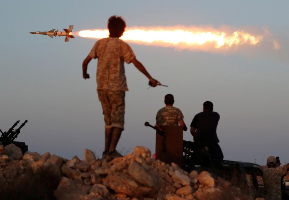 Fighters of Libyan forces allied with the ...