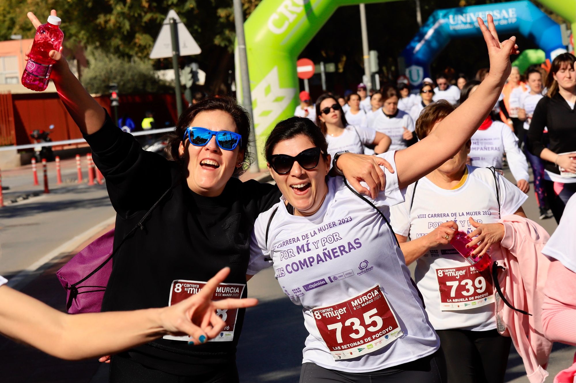 La salida y el recorrido de la Carrera de la Mujer 'inmortalizados' en imágenes