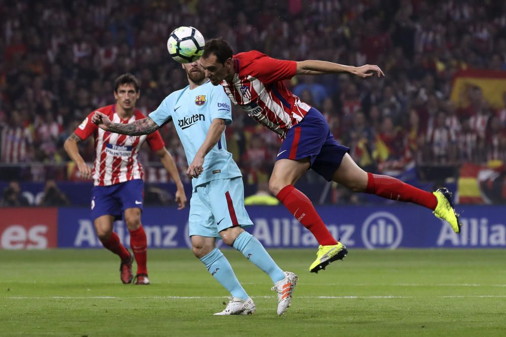 Imágenes del partido entre Atlético y Barcelona.