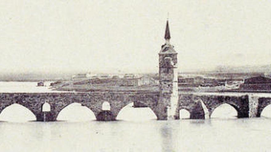 Vista del Puente de Piedra, antes de la demolición de las torres.