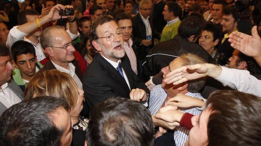 El alcalde, con Rajoy, en un mitin electoral.