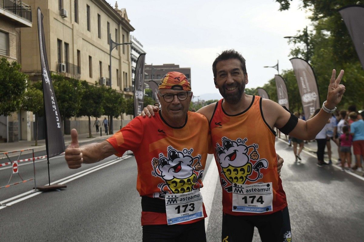 La carrera y marcha Solidaria Asteamur, en imágenes