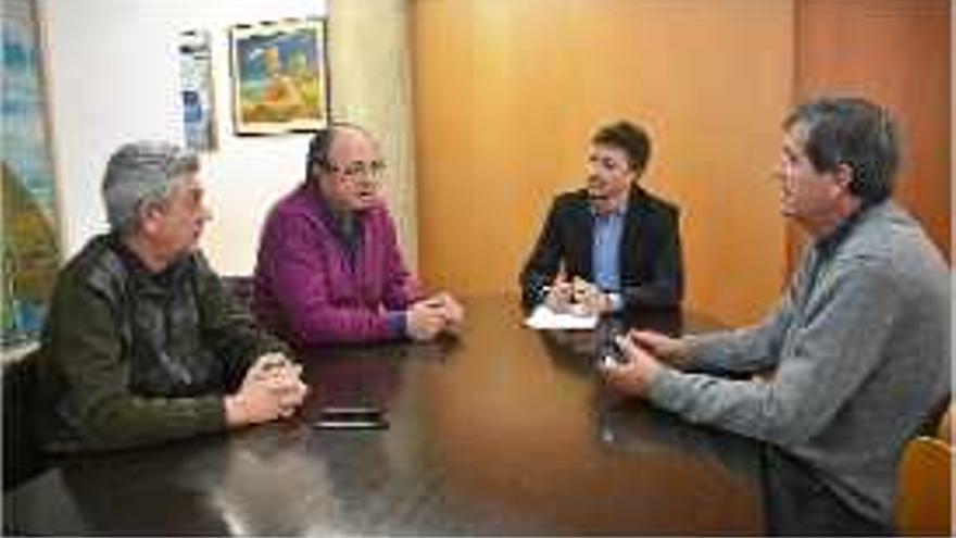 Bruguera, Guinart, Puga i Puig (d&#039;esquerra a dreta) ahir a la reunió.