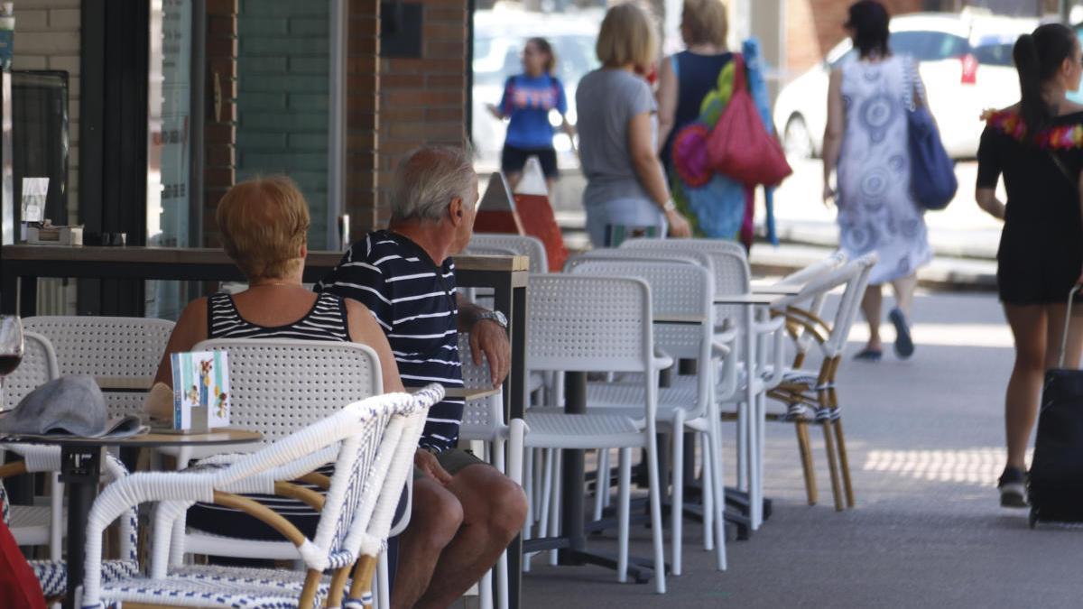 Uns turistes en unes terrasses.