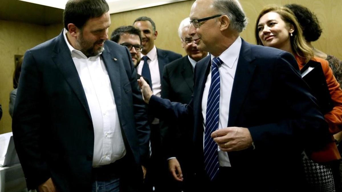 Oriol Junqueras y Cristóbal Montoro, en el Consejo de Política Fiscal y Financiera.