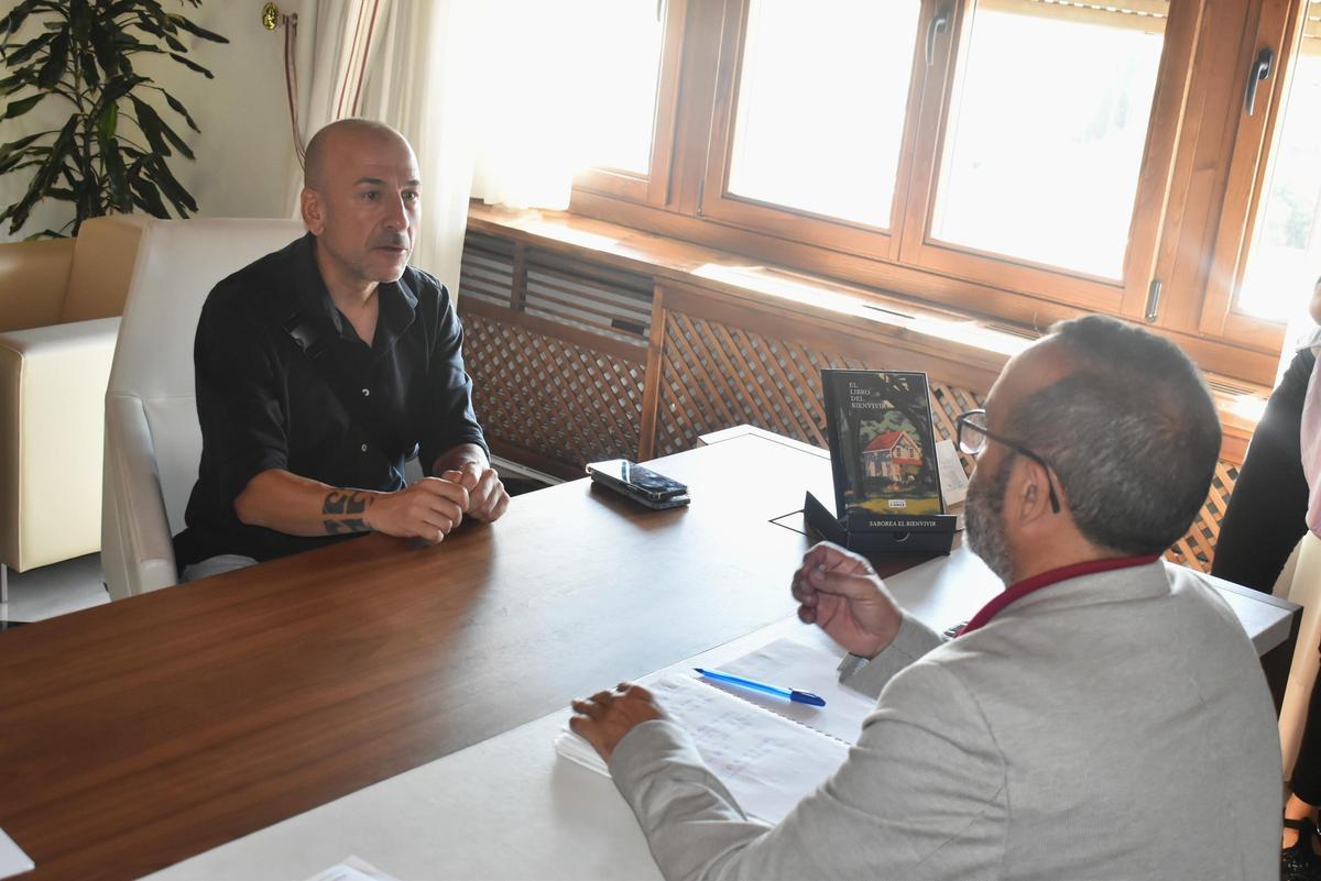 Ricardo Villegas y Miguel Ángel Morales, en la reunión.