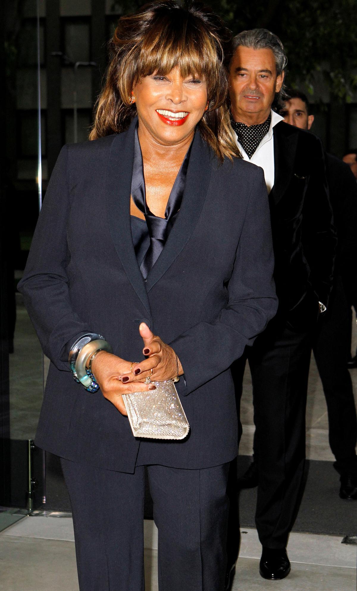 FILE PHOTO: Tina Turner smiles before Giorgio Armanis fashion show to celebrate 40th anniversary of his career and to mark opening of the Expo 2015 in Milan