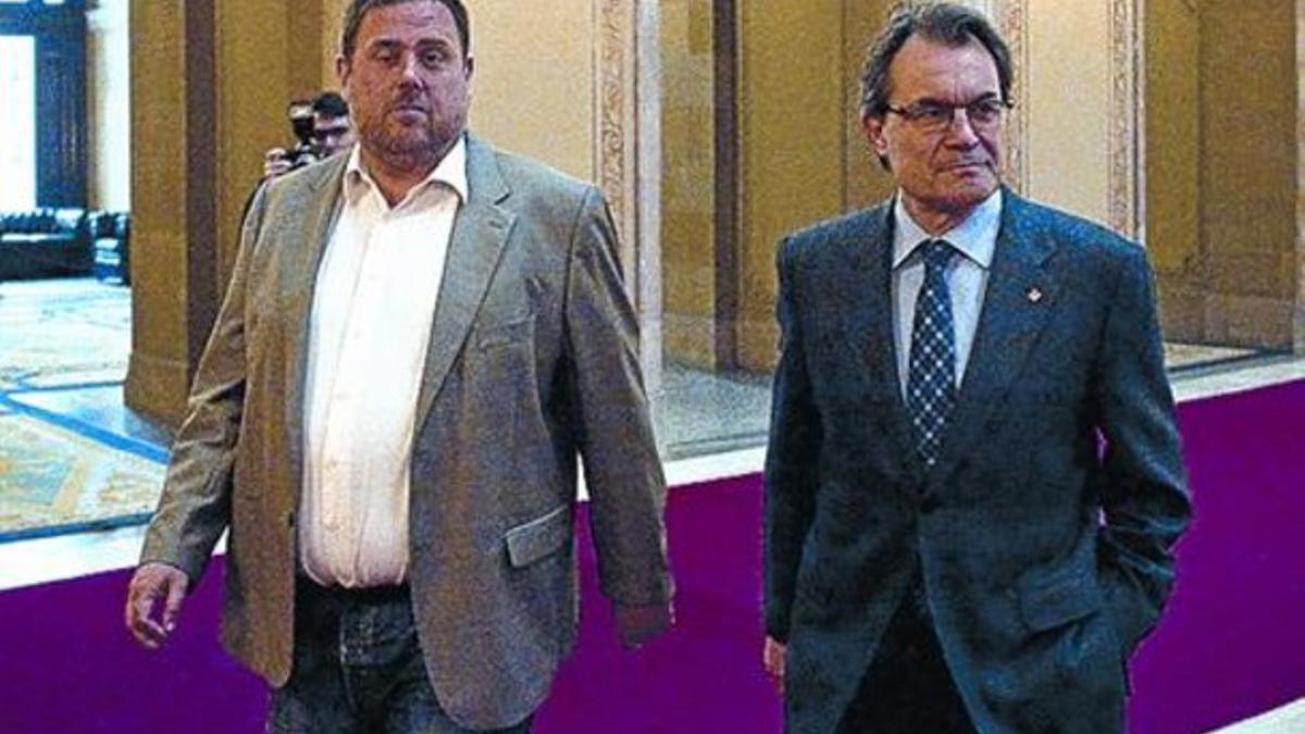 Oriol Junqueras y Artur Mas, la semana pasada en el Parlament.