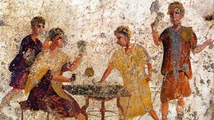 Jugadores de dados en un fresco de Pompeya