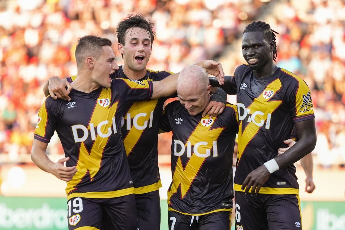 Rayo midfielder Isi Palazon (2R) celebrates with his teammates after scoring the team's third goal during the LaLiga first matchday match between Girona CF and Rayo Vallecano, at the Montilivi Municipal Stadium of Girona, Spain, 15 August 2025. EFE/Siu Wu