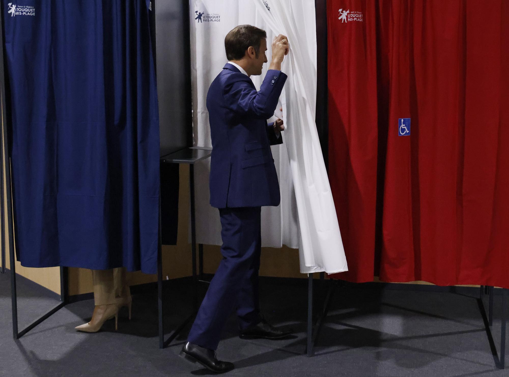 French President Macron votes in first round of legislative elections