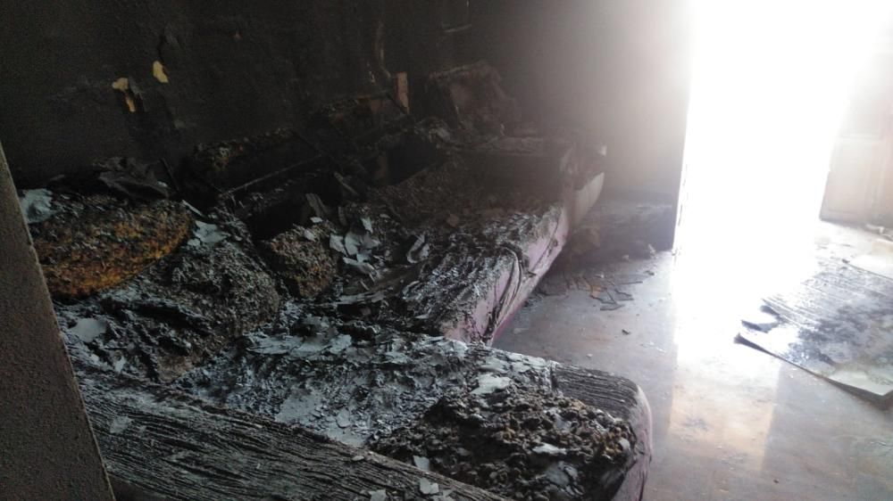 Los vecinos de Campanillas rescatan a una familia en un incendio de una vivienda