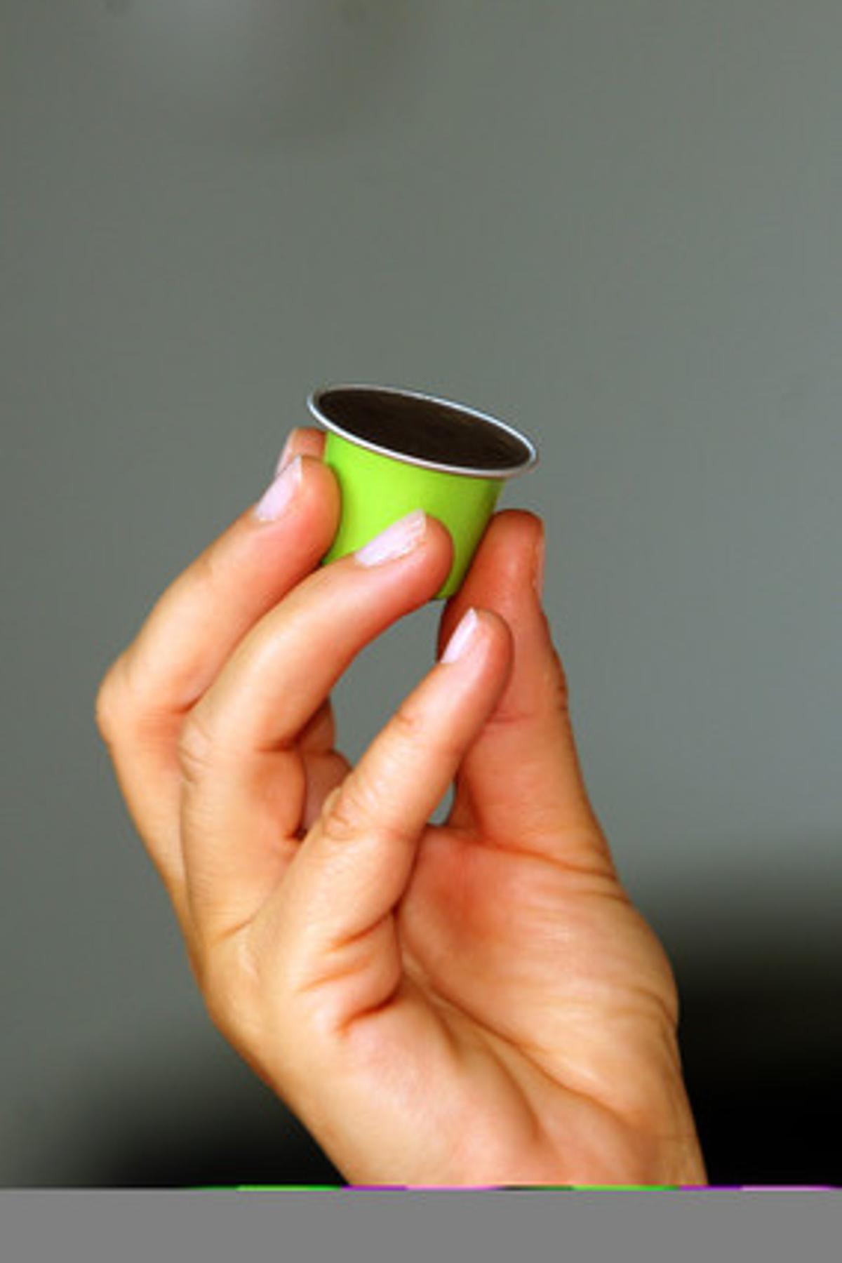 Una càpsula monodosi de cafè mòlt. Una càpsula monodosi de cafè mòlt.