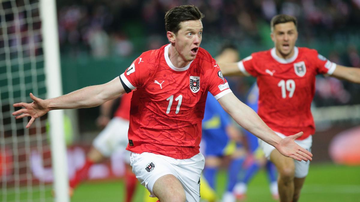 Austria's Michael Gregoritsch celebrates his side's equalizing goal during a group H World Cup qualifiying soccer match between Austria and Bosnia and Herzegovina in Vienna, Austria, Tuesday, Nov. 18, 2025. (AP Photo/Heinz-Peter Bader)
