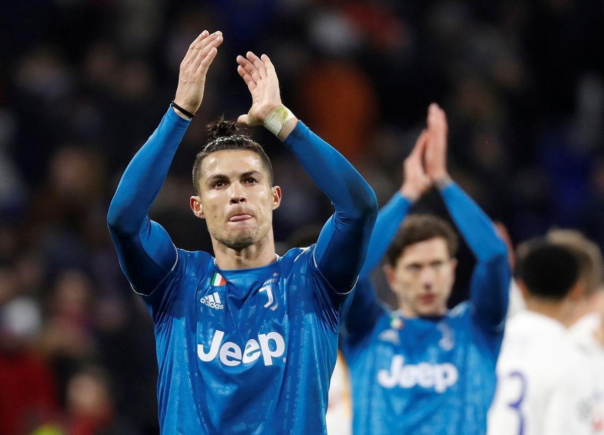 FILE PHOTO: Soccer Football - Champions League - Round of 16 First Leg - Olympique Lyonnais v Juventus - Groupama Stadium, Lyon, France - February 26, 2020  Juventus’ Cristiano Ronaldo looks dejected as he applauds fans at the end of the match   REUTERS/Eric Gaillard/File Photo