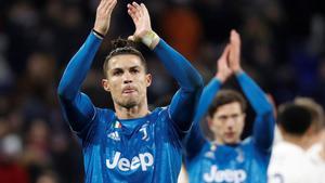FILE PHOTO: Soccer Football - Champions League - Round of 16 First Leg - Olympique Lyonnais v Juventus - Groupama Stadium, Lyon, France - February 26, 2020  Juventus’ Cristiano Ronaldo looks dejected as he applauds fans at the end of the match   REUTERS/Eric Gaillard/File Photo