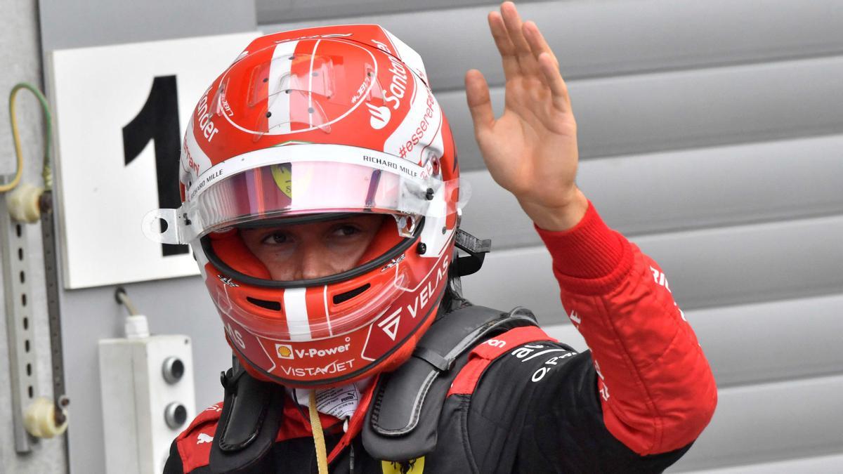 Ferrari's Spanish driver Carlos Sainz Jr reacts after winning the qualifying session for the Belgian Formula One Grand Prix at Spa-Francorchamps racetrack in Spa, on August 27, 2022. (Photo by Geert Vanden Wijngaert / POOL / AFP)