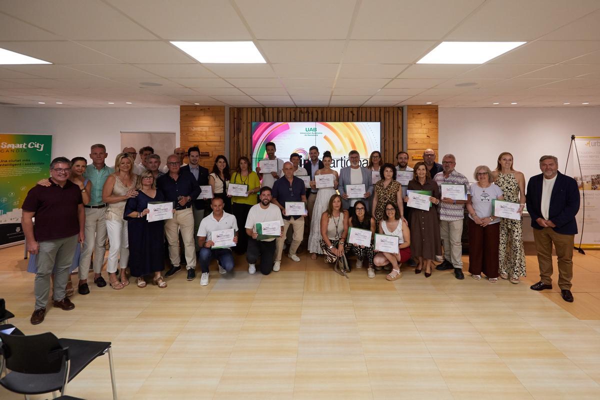 Representantes de los ayuntamientos premiados.