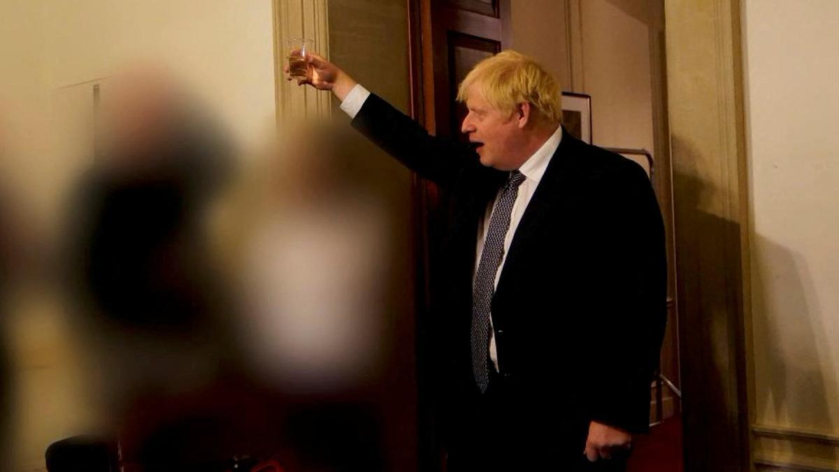 Pictures published in Sue Gray's report British Prime Minister Boris Johnson gestures in 10 Downing Street during gathering on the departure of a special adviser, in London, Britain November 13, 2020 in this picture obtained from civil servant Sue Gray's report published on May 25, 2022. Sue Gray Report / gov.uk/Handout via REUTERS