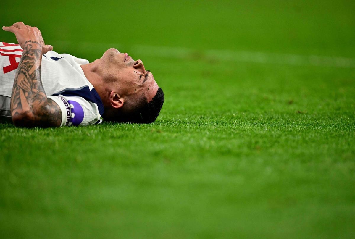 Tottenham Hotspur's Spanish defender #23 Pedro Porro goes down injured during the English Premier League football match between Tottenham Hotspur and Crystal Palace at the Tottenham Hotspur Stadium in London, on March 5, 2026. (Photo by Ben STANSALL / AFP) / RESTRICTED TO EDITORIAL USE. No use with unauthorized audio, video, data, fixture lists, club/league logos or 'live' services. Online in-match use limited to 120 images. An additional 40 images may be used in extra time. No video emulation. Social media in-match use limited to 120 images. An additional 40 images may be used in extra time. No use in betting publications, games or single club/league/player publications. /. SEE CAPTION FOR MORE INFORMATION / RESTRICTED TO EDITORIAL USE. No use with unauthorized audio, video, data, fixture lists, club/league logos or 'live' services. Online in-match use limited to 120 images. An additional 40 images may be used in extra time