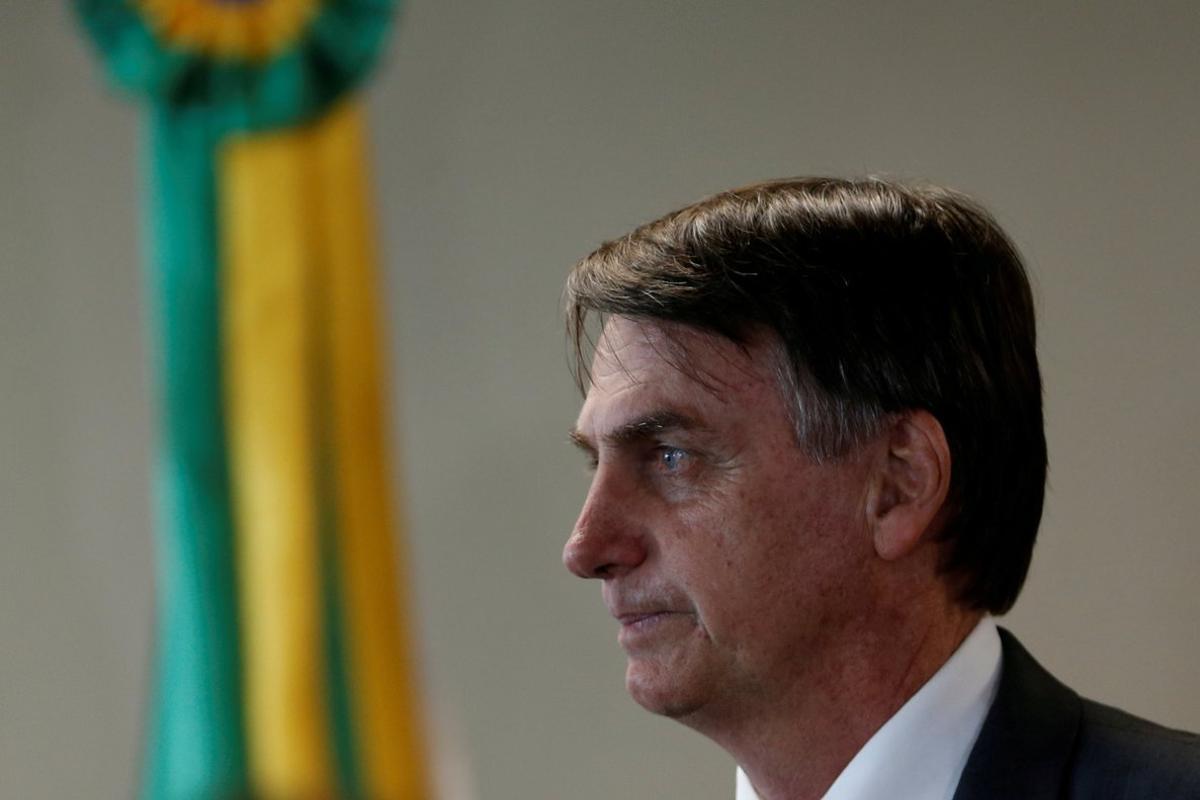 FILE PHOTO  Brazil s President-elect Jair Bolsonaro gestures during a meeting at Superior Labor Court in Brasilia  Brazil November 13  2018  REUTERS Adriano Machado - RC1876A15990 File Photo