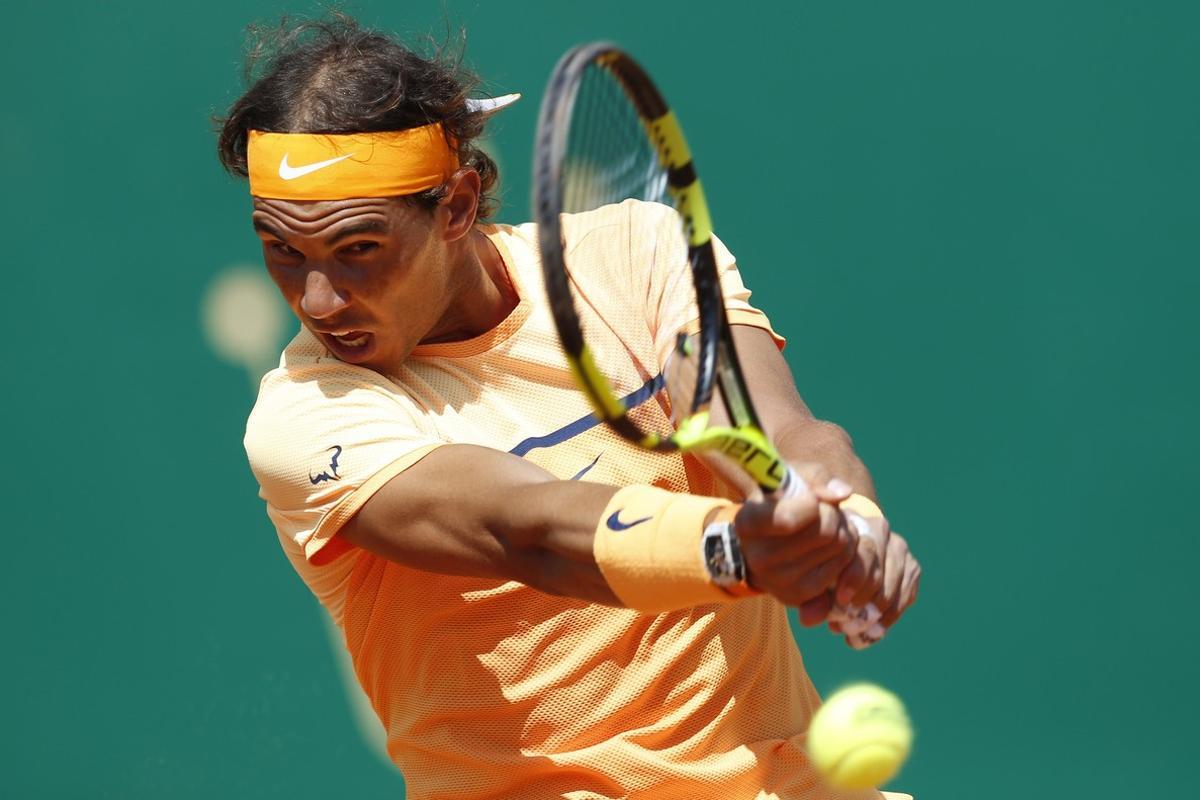 Spain’s Rafael Nadal returns the ball to Britain’s Aljaz Bedene during their Monte-Carlo ATP Masters Series Tournament, on April 13, 2016 in Monaco.   AFP PHOTO / VALERY HACHE