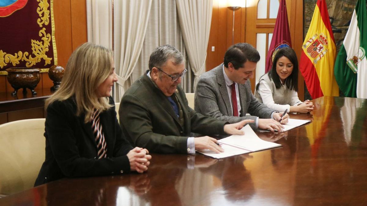 Firma convenio acciones Minecraft.