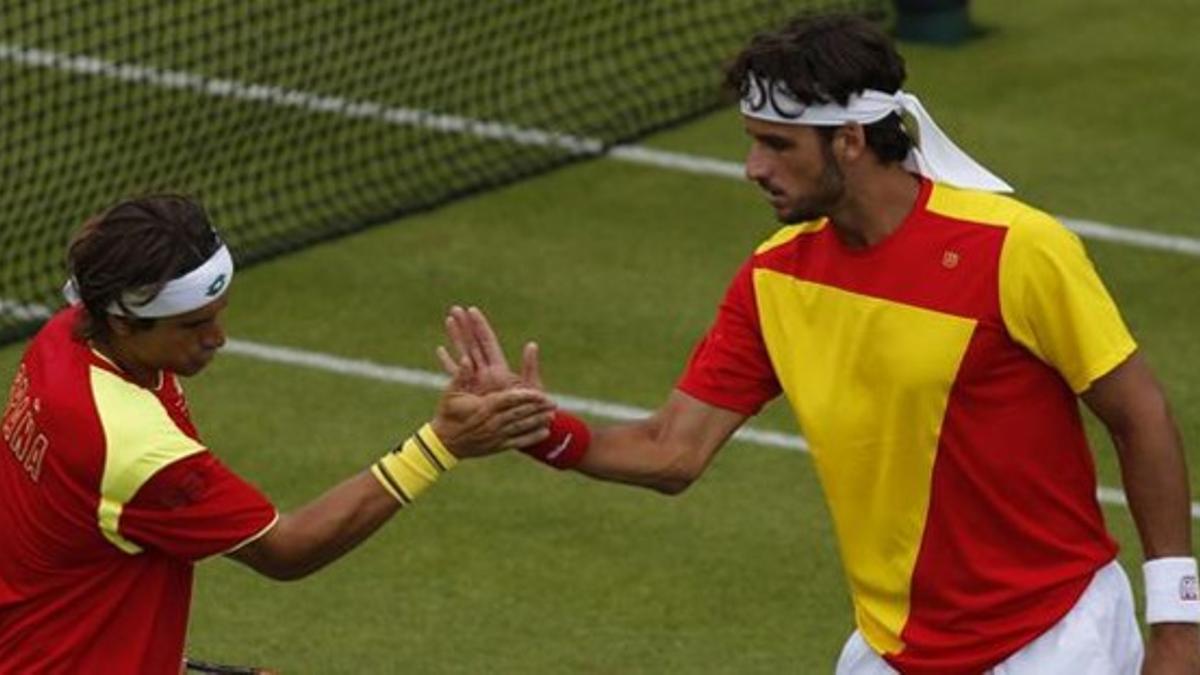 Ferrer y Feli López, durante el partido.