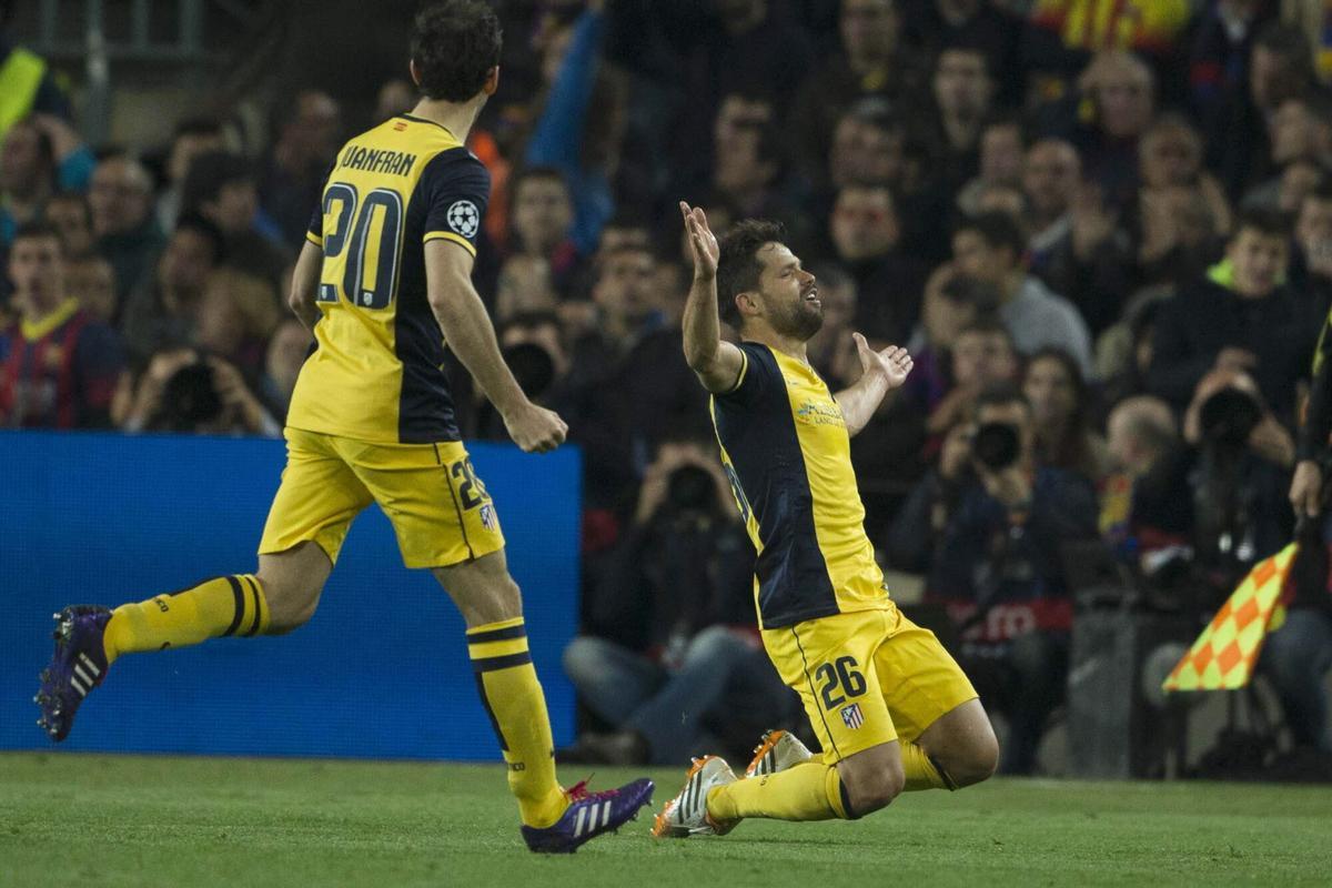FUTBOL LIGA CAMPEONES, BARCELONA , ATLETICO DE MADRID , JUGADOR Diego Ribas celebra su gol ante el Barça en presencia de Juanfran.GRA459. BARCELONA, 01/04/2014