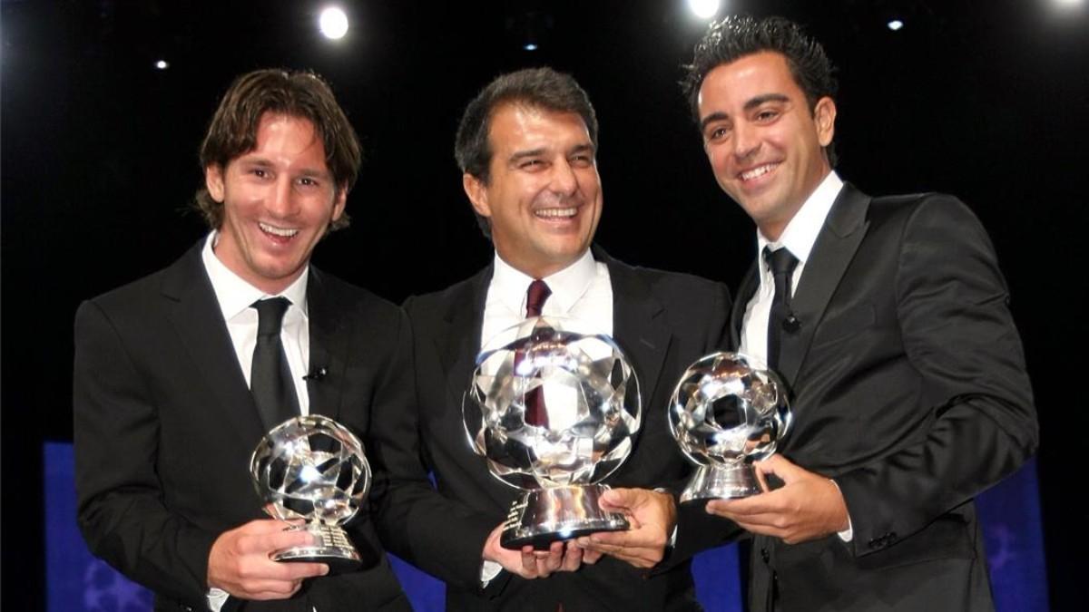 Laporta, junto a Leo Messi y Xavi Hernández, en una gala de la UEFA