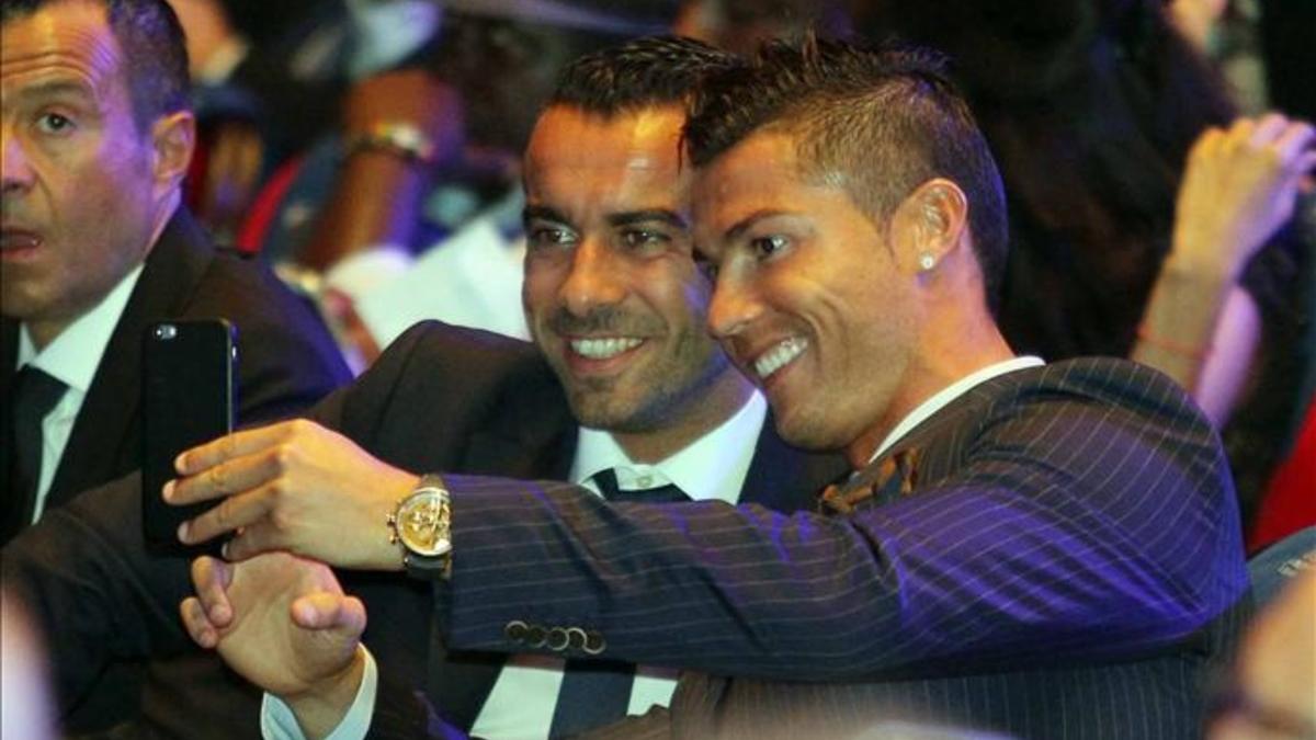 Cristiano Ronaldo con su representante Jorge Mendes